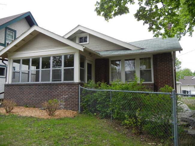 Photo - Charming 3-Bed Home with Hardwood Floors and 1400 Sq Ft of Comfort in Minneapolis