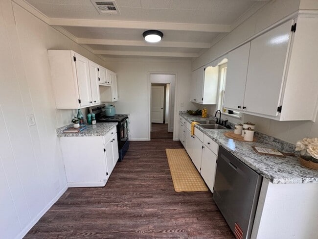 Photo - Brand New inside, great neighborhood and large fenced yard!  Call us today to make this your new ...