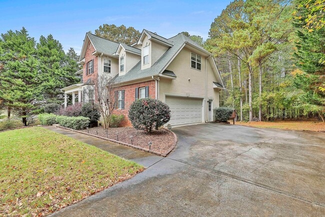 Photo - Luxury Millpond Manor Home in Starr’s Mill...