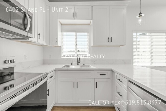 Building Photo - 6402 Shane Pl Unit 2