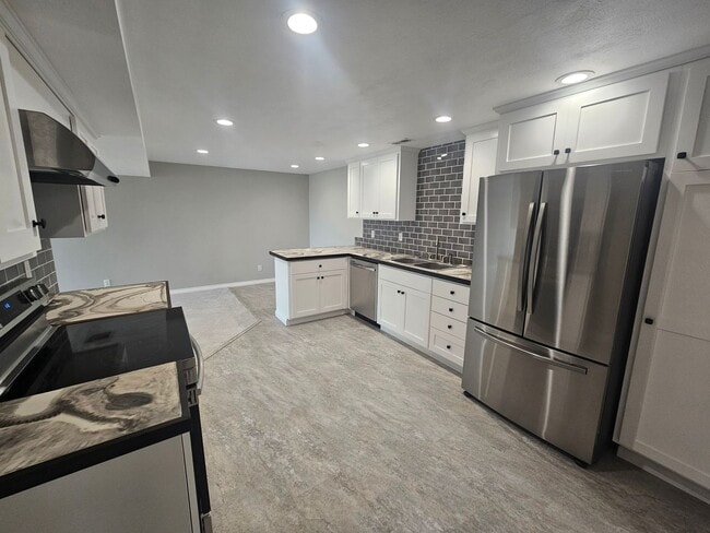 Photo - Fully Remodeled Daylight Basement + Utilities!