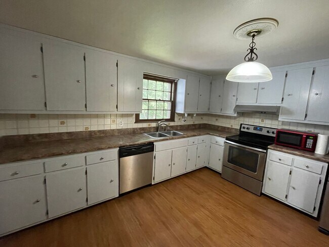 Photo - Three bedroom single family home on 1/2 ac...
