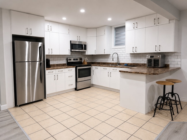 Spacious kitchen - 203 Rue Dollard-Des Ormeaux Unit Furnished 2BR / 1BA Apartment