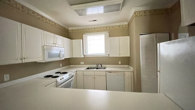 Photo - REDUCED! Large Unfurnished 2 Bedroom Condo... Unit 203-36