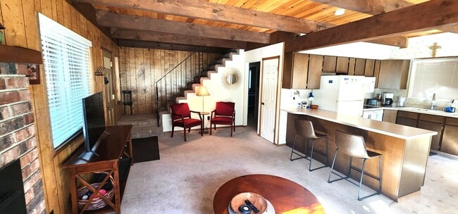 Photo - Unfurnished 4 Bed, 2 Bath with Garage. Amazing Location on Dead-End Street with Forest Access!