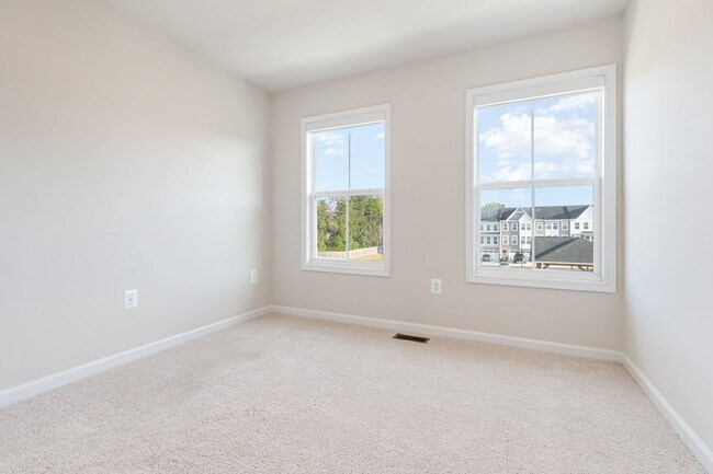 Photo - $2,850/Month | 4 Bed | 4 Bath | Built in 2023 | Tesla Charger | 2,268 SF | Available August 15