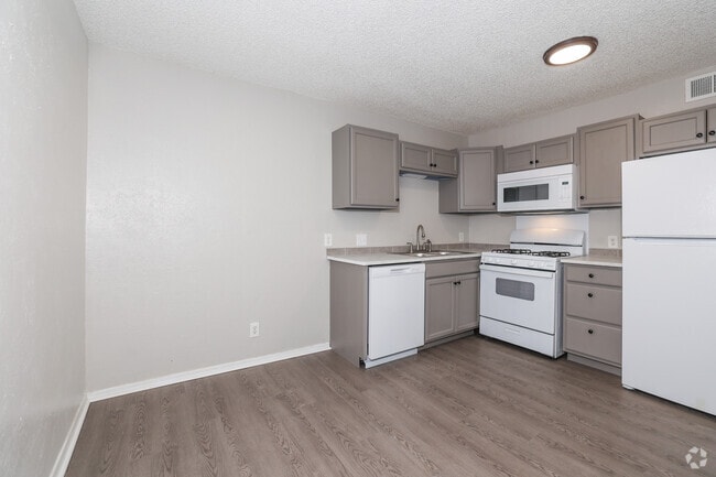 2BR, 1BA - 719SF - Kitchen and Dining Area