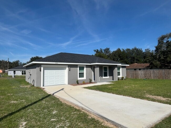 Photo - New Construction 3/2/ in Dunnellon