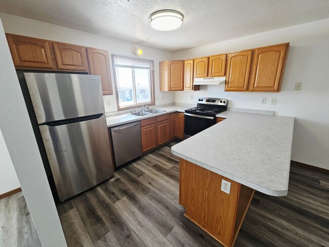 Building Photo - Fully Remodeled 1,250 Sq Ft 2 Bedroom Apartment with Garage, In-Unit Laundry & Private Balcony – ...