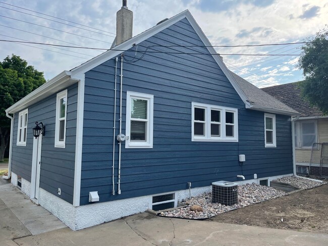 Photo - One block from USF! Huge home with 4 bedrooms! Fenced in yard