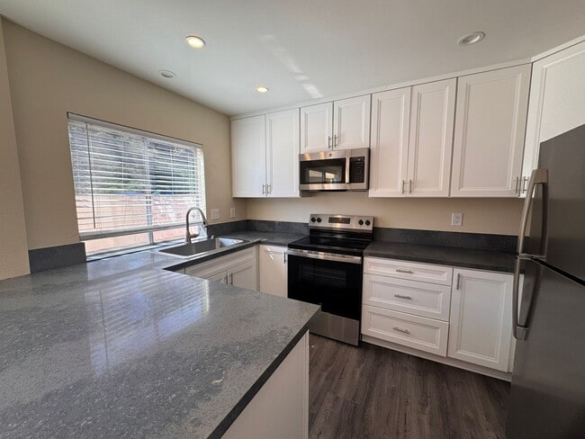 Building Photo - Spacious 4-Bed Townhome in the Heart of Cl...