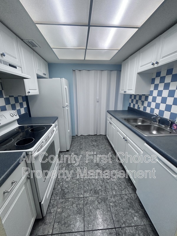 Photo - 11415 8th Way N Unit 608