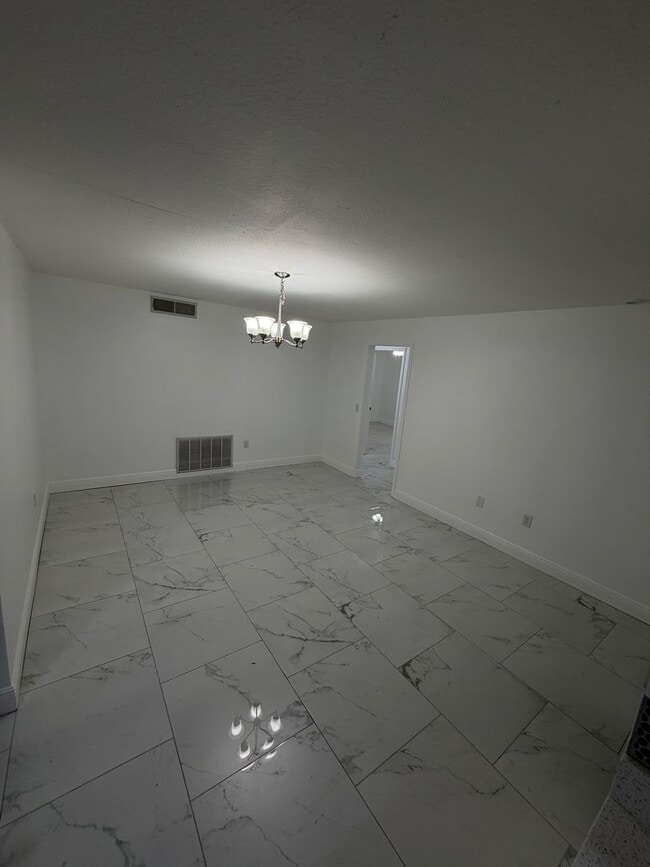 Photo - Recently Remodeled 3-Bedroom Home with Tile Floors, Yard & 2-Car Garage in Orlando