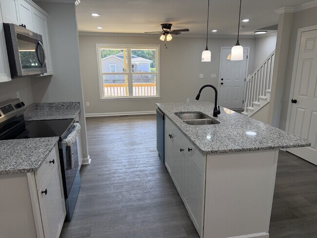 Photo - Pet-Friendly Charming 3-Bedroom, 2-Bath Home on Harrison Ave – Your Cozy Retreat Awaits!"