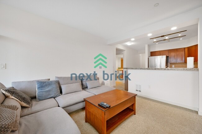 Photo - Beautiful 2BR + Den Condo with Garage Parking in Vibrant Downtown Kirkland Unit #303