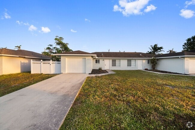 Building Photo - ANNUAL RENTAL - 2 Bedroom, 1 Bath w/ Garag...