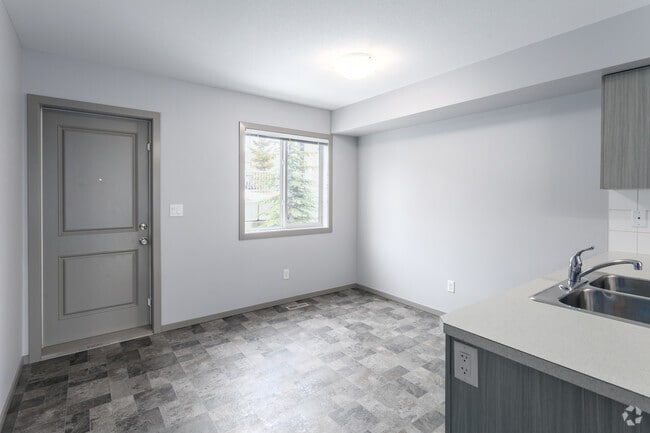 2 chambres, 3 salles de bain - 1132 pi² (+566 pi² au sous-sol) - - Belmont Village Townhomes