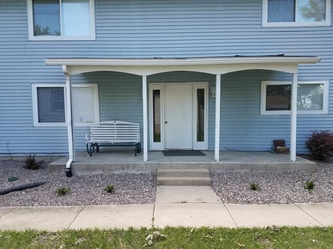 Front door side view to 4-plex - 306 E Henry St Unit Apt. 1