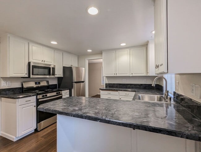 Photo - **Move-in Special!!!** Updated & move in ready 3 bed 2 bath rambler w/ 2 car garage!