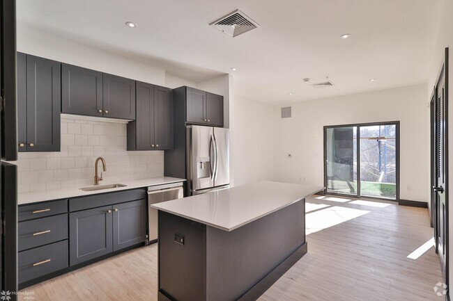 Building Photo - Two-bedroom apartments coming available at... Unit 2 Bedroom