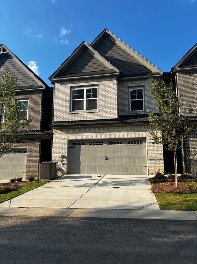 Building Photo - Brand-New 3-Bedroom Townhome for Rent in K...