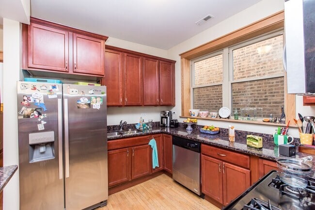 Building Photo - 1048 N Oakley Blvd Unit 2 Rental