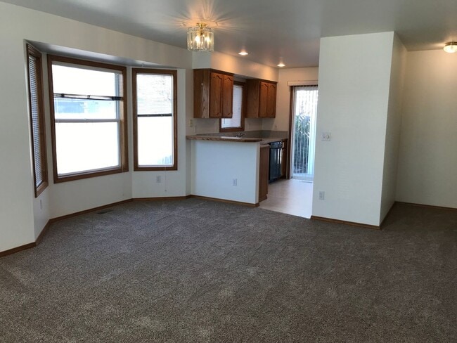 Photo - Adorable Well-Cared-For Duplex w/ Garage & Manicured Backyard!