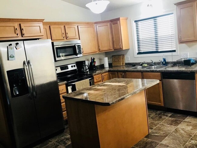 Photo - 3 Bedroom Townhome | Attached Double Stall Garage | Spacious