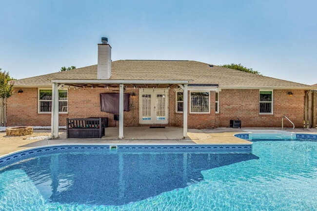 Photo - Welcome to your dream home! This stunning 4-bedroom, 3-bathroom residence is perfectly situated n...