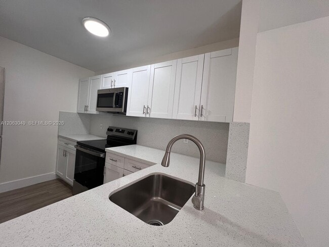 Photo - 2685 W 66th St Unit 12-20