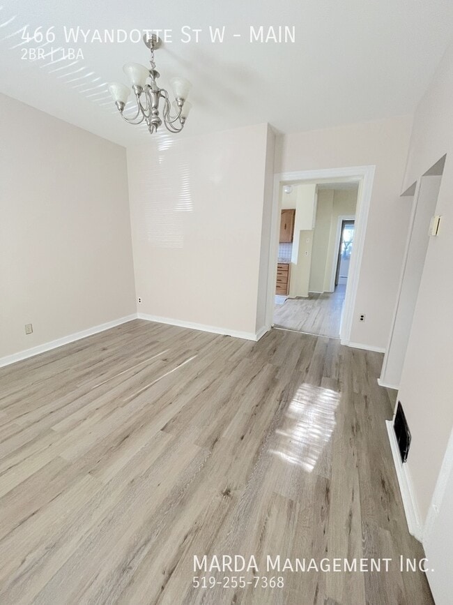 Building Photo - COZY 2 BEDROOM 1 BATH MAIN FLOOR Unit MAIN