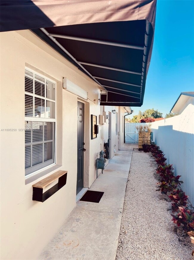 Building Photo - 11611 NW 57th Ct Unit 1