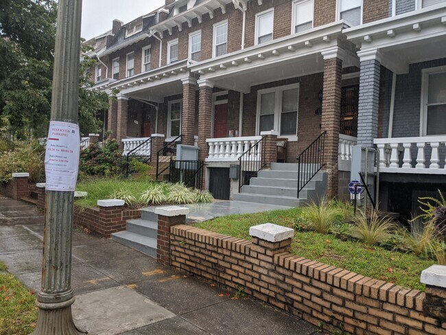 Front of house, view of basement entrance - 910 Quincy St NW Apartments Unit B