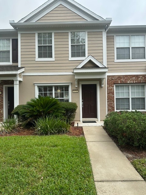 Building Photo - Stunning Townhome With Pond View In Gated Community