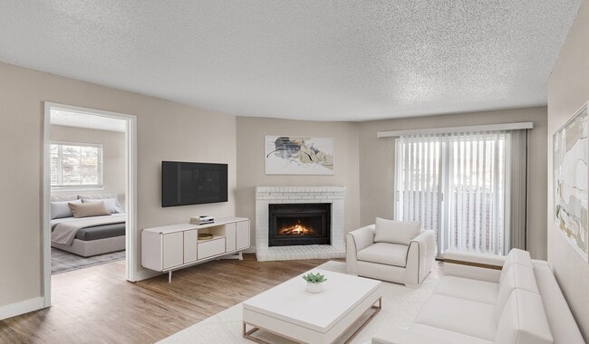 Spacious living rooms designed for comfort and style. - Verona Apartment Homes