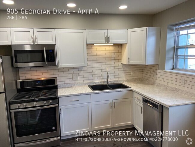 Building Photo - Newly Remodeled two bedroom 1.5 bath suite... Unit Apt# A