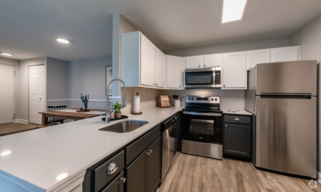 Enjoy newly renovated apartment homes with stainless steel appliances. - Avana Northlake Rental