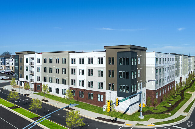 Building Photo - The Compass at Springdale Park Rental