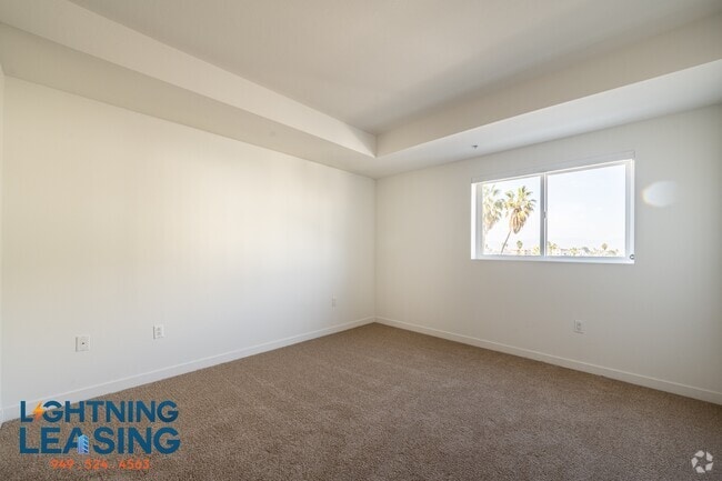 Building Photo - 11407 Chandler Blvd Unit 402D Rental