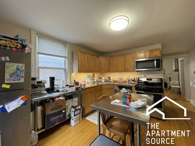 Building Photo - 3434 W Drummond Plz Unit 1