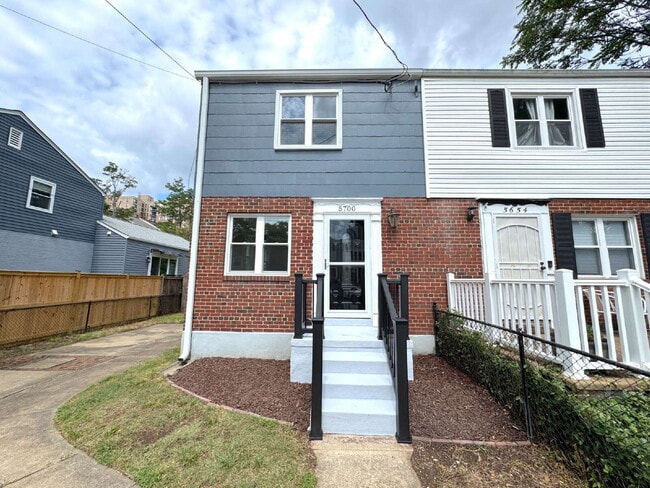 Photo - Charming 2BR Townhome with Finished Basement, Fenced Yard & Private Driveway Near Huntington Metro