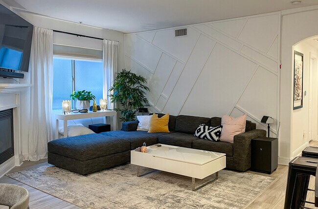 extra long sofa allows for ultimage lounging - 5037 Rosewood Ave Unit 101