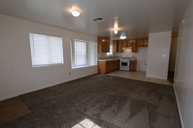 Photo - Spacious 3-Bedroom Duplex with Private Patio and Prime Location