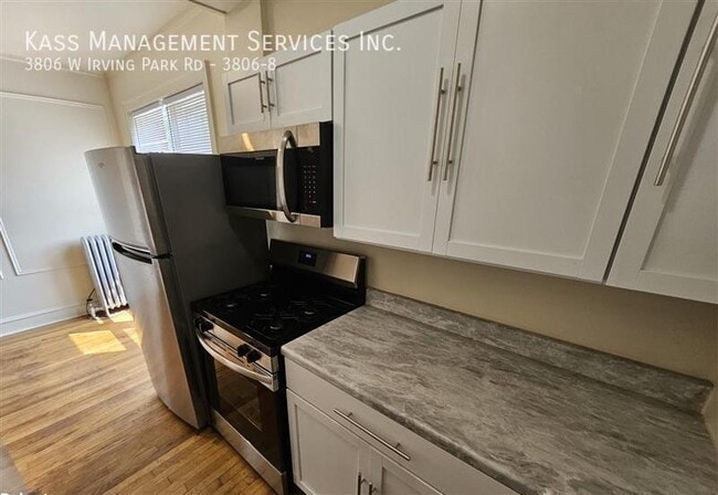 Building Photo - 3806 W Irving Park Rd Unit 3806-8 Rental