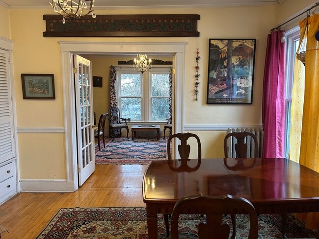 Dining room and living room - 127 White St Unit Bohemian Luxury near Harvard/MIT