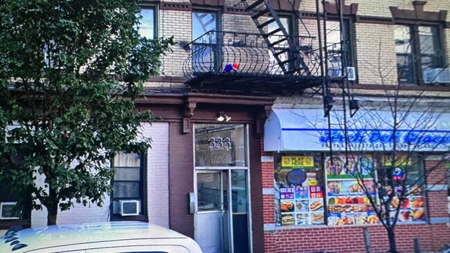 Building Photo - 333 61st St Unit 2