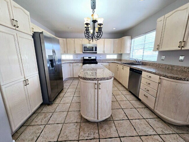 Photo - "Spacious 3-Bed Oasis with 2.5 Baths on Funston Way, Las Vegas - 2,264 Sq. Ft. of Comfort!"