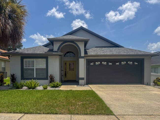 Building Photo - Beautifully updated and modern 5 bedroom 4 bathroom pool home located in the Orange Tree