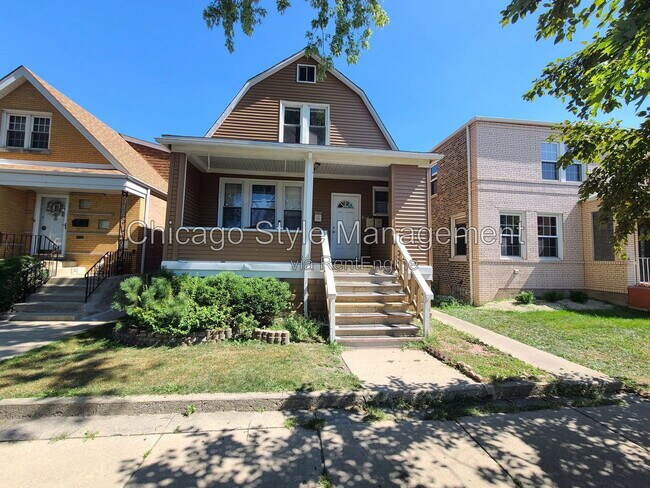 Building Photo - 6035 S Karlov Ave Unit 2nd Floor