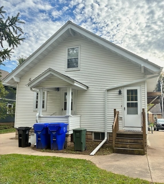 Back entrance - private driveway on the right side - 1220 W Packard St